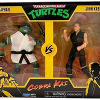 Teenage Mutant Ninja Turtles vs Cobra Kai 6 Inch Action Figure 2-Pack - Raphael vs John Kreese